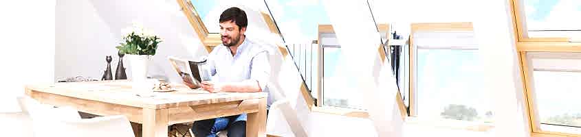 Innovative, large roof window in which the open sashes create a balcony - FAKRO